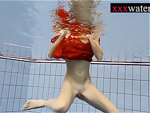 uber-sexy scorching gal swimming in the pool
